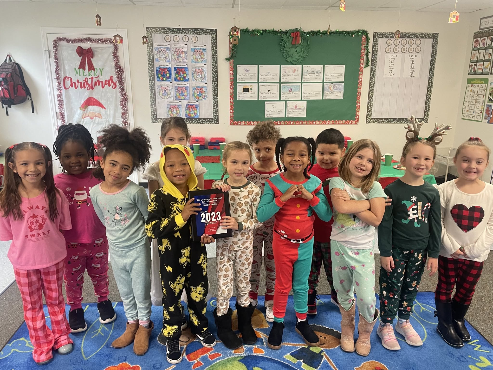 BIC Community Preschool kids holding Best of Upland award